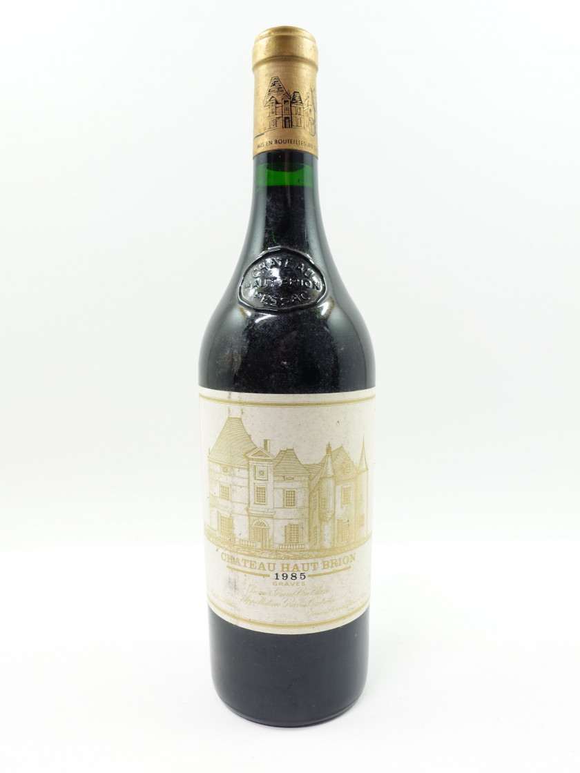 1 bouteille CHÂTEAU HAUT BRION 1985 1er GC Pessac Léognan (étiquette sale et tachée)