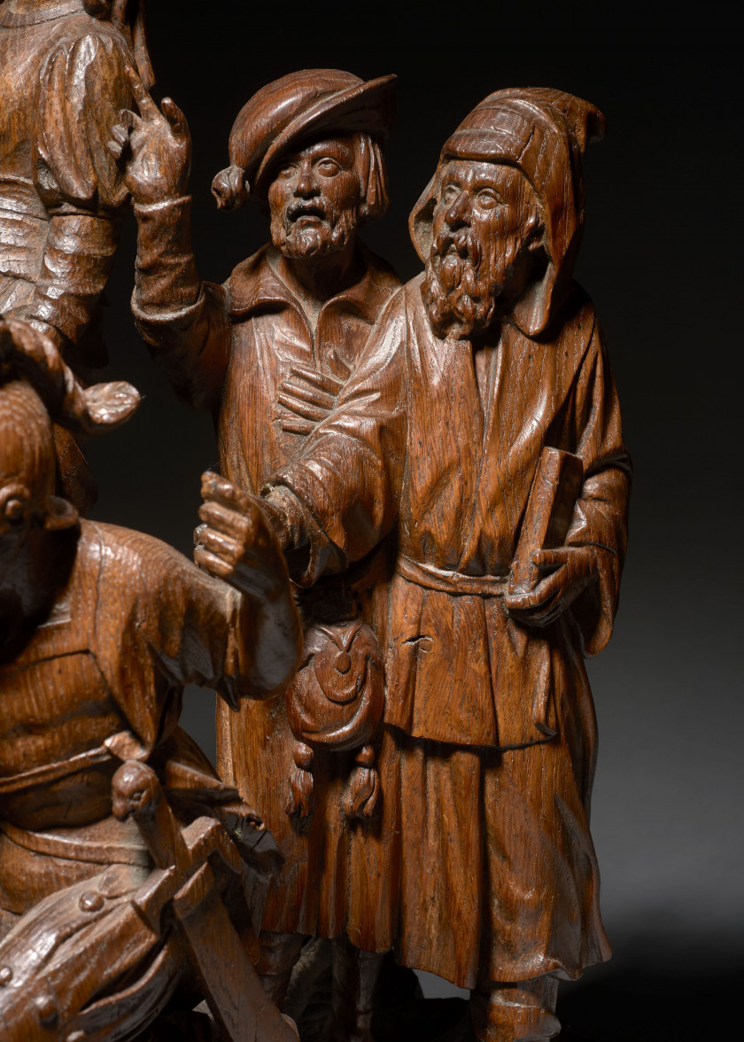 GROUPE D'UN RETABLE EN CHÊNE SCULPTÉ, FLANDRES, ANVERS, VERS 1500-1515 Scène de la Passion du Christ représentant le partage des vêt..