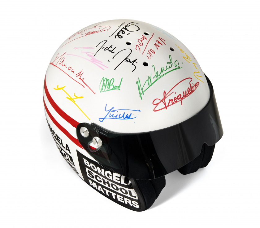 TOUR AUTO WINNERS, VENTE CARITATIVE AU PROFIT DE LA BONGELA SCHOOL  Casque Stand 21 et dessin du projet original par Alain Bouldouyr...