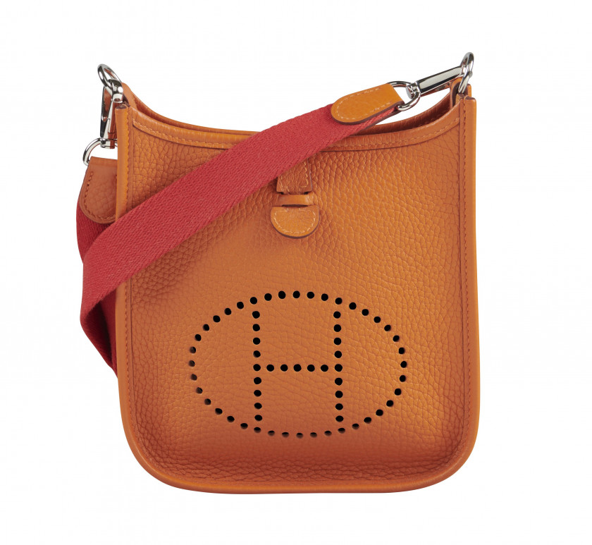 HERMÈS 2016  Sac Mini ÉVELYNE Taurillon Clémence orange Garniture métal argenté palladié Dimensions : 16,5 x 18 x 5,5 cm...