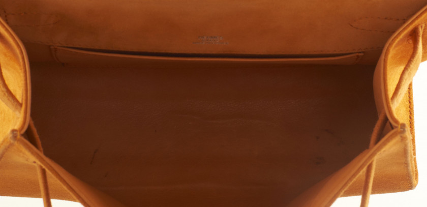 HERMÈS 2006  Pochette KELLY Veau Doblis orange Garniture métal argenté palladié  Pochette KELLY Orange Doblis calfsk...
