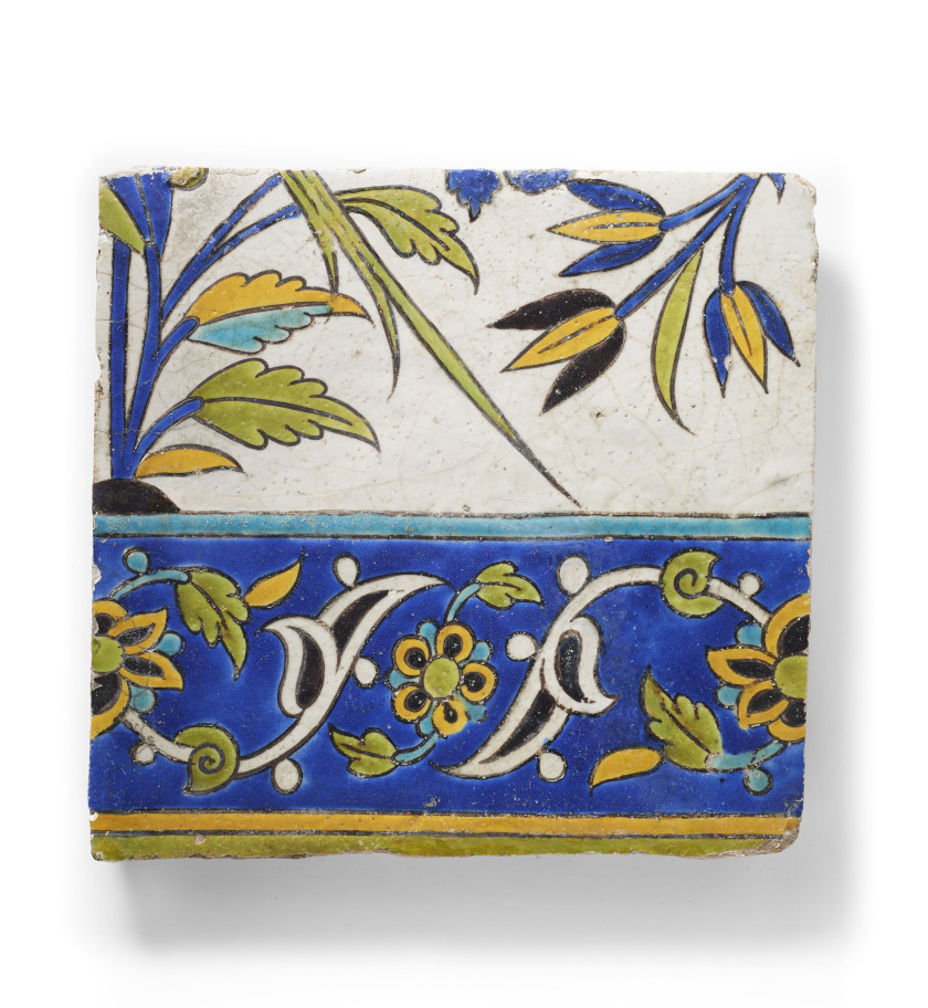 CARREAU DE BORDURE À DÉCOR " CUERDA SECA "  Iran safavide, XVIIe siècle