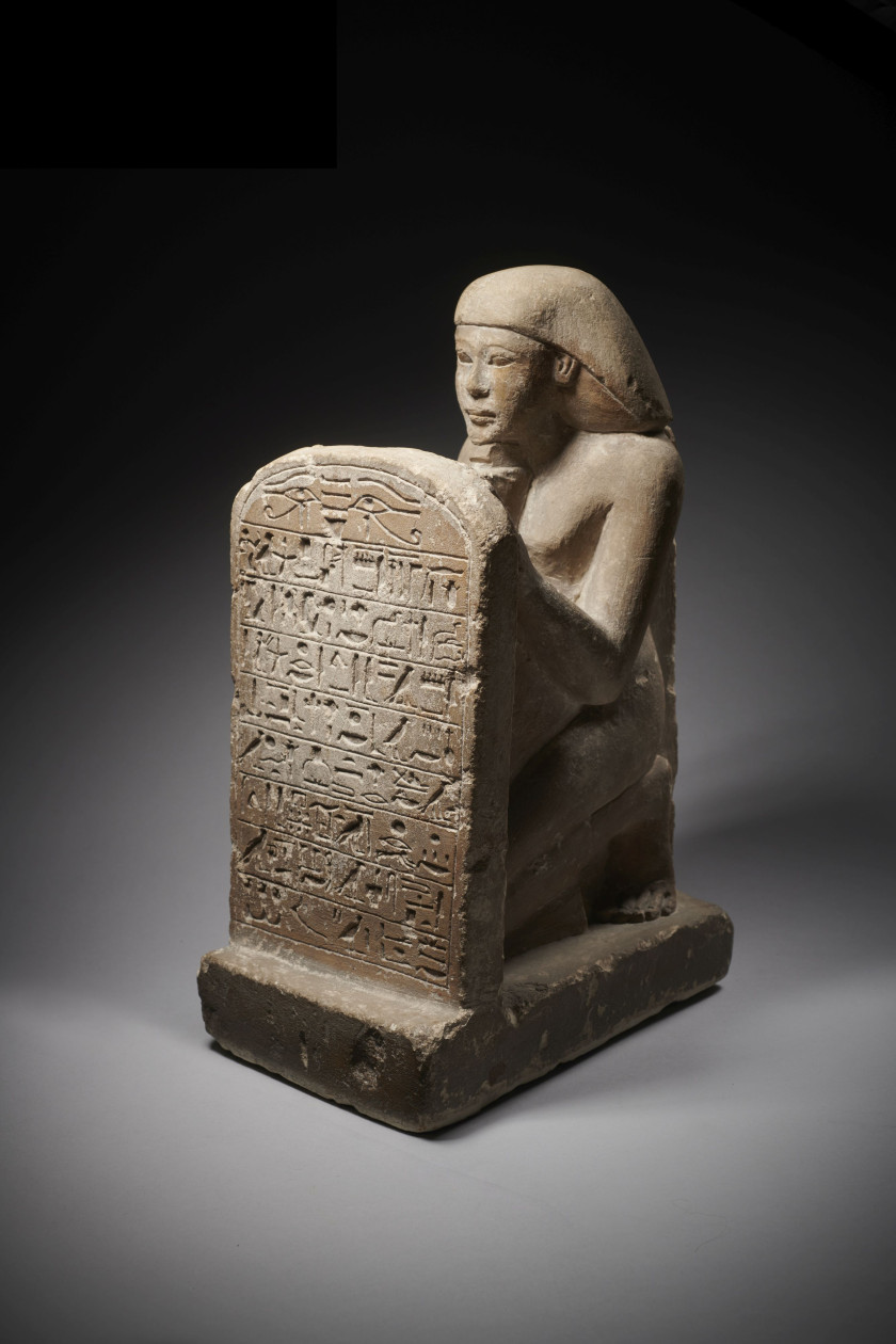 An Egyptian limestone stelophorous statue of Pendouaou, New Kingdom, second half of the 18th Dynasty