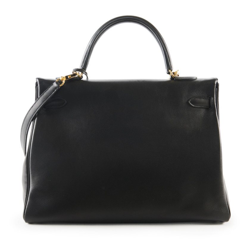 HERMÈS 2010  Sac KELLY Retourné 35 Veau Swift noir Garniture métal plaqué or Bandoulière  KELLY Retourné 35 bag Bl...