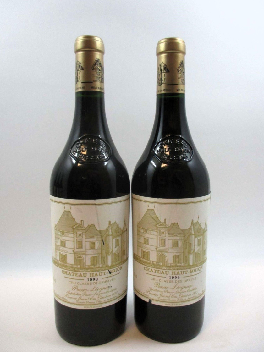 12 bouteilles CHÂTEAU HAUT BRION 1999 1er GC Pessac Léognan (étiquettes abimées léger déchirées)