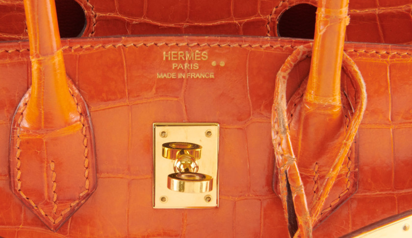 HERMÈS 2007  Sac BIRKIN 25  Crocodile du Nil lisse orange (Crocodylus niloticus) II/B Garniture métal plaqué or  BIR...